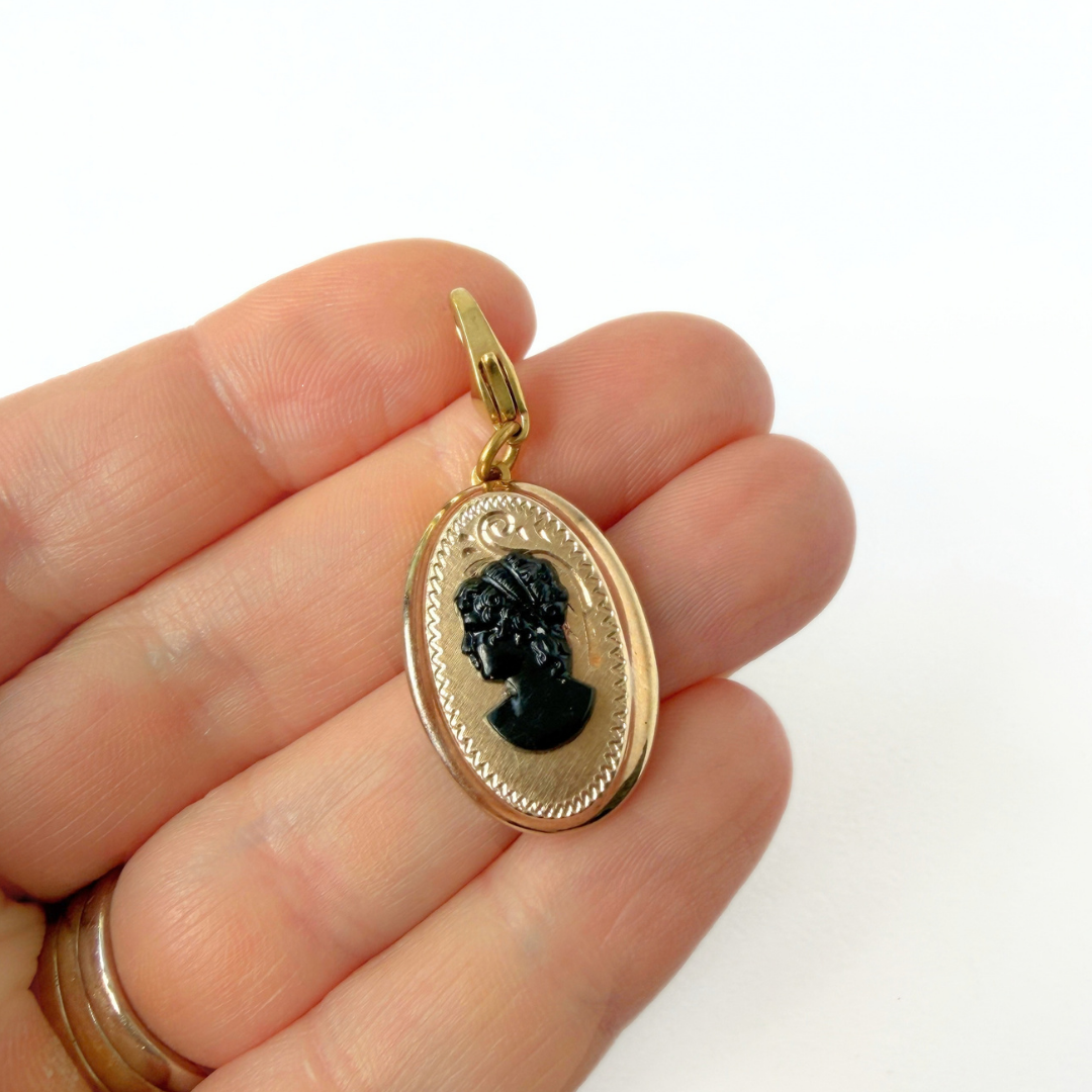Vintage gold plated oval charm with black cameo silhouette (Copy)