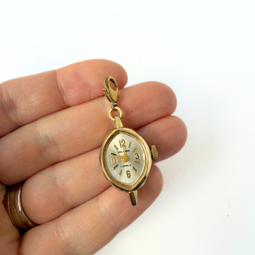Vintage gold plated "Waltham" watch face charm