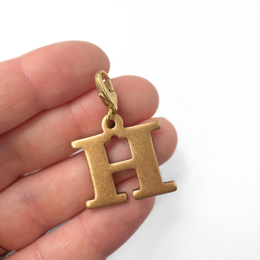 Chunky bronze letter "H" charm