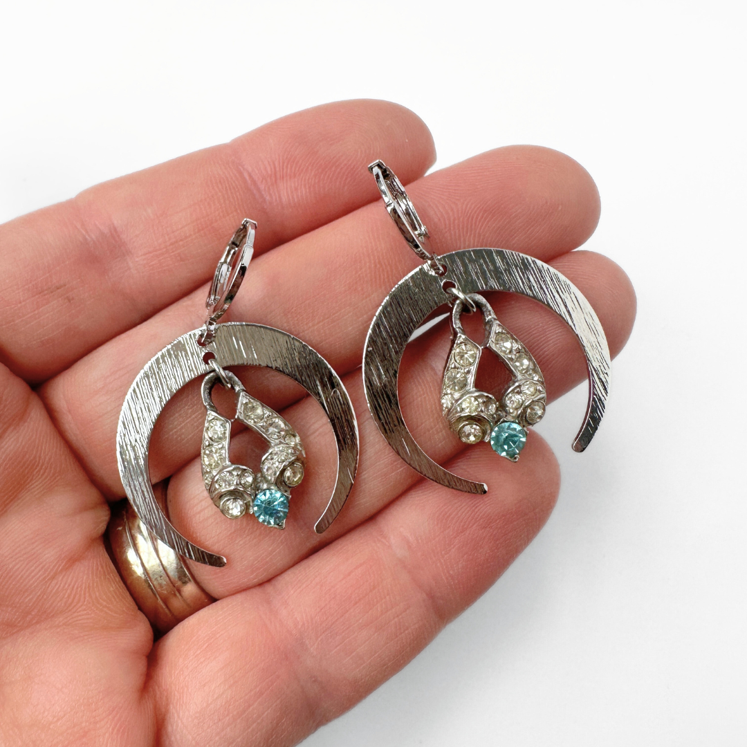 Silver crescent hoop earrings with vintage clear and aqua rhinestone drops