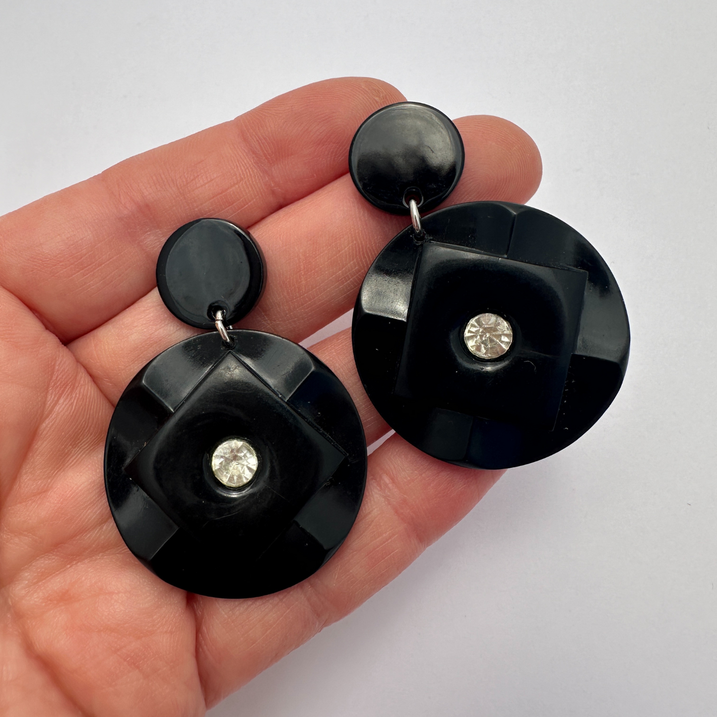 Large vintage black button earrings with rhinestone center