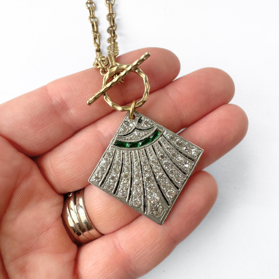 Vintage clear and emerald rhinestone deco pendant with brass chain and toggle