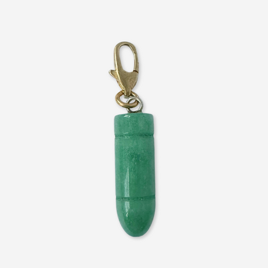 Green stone pendant with gold clasp on a white background