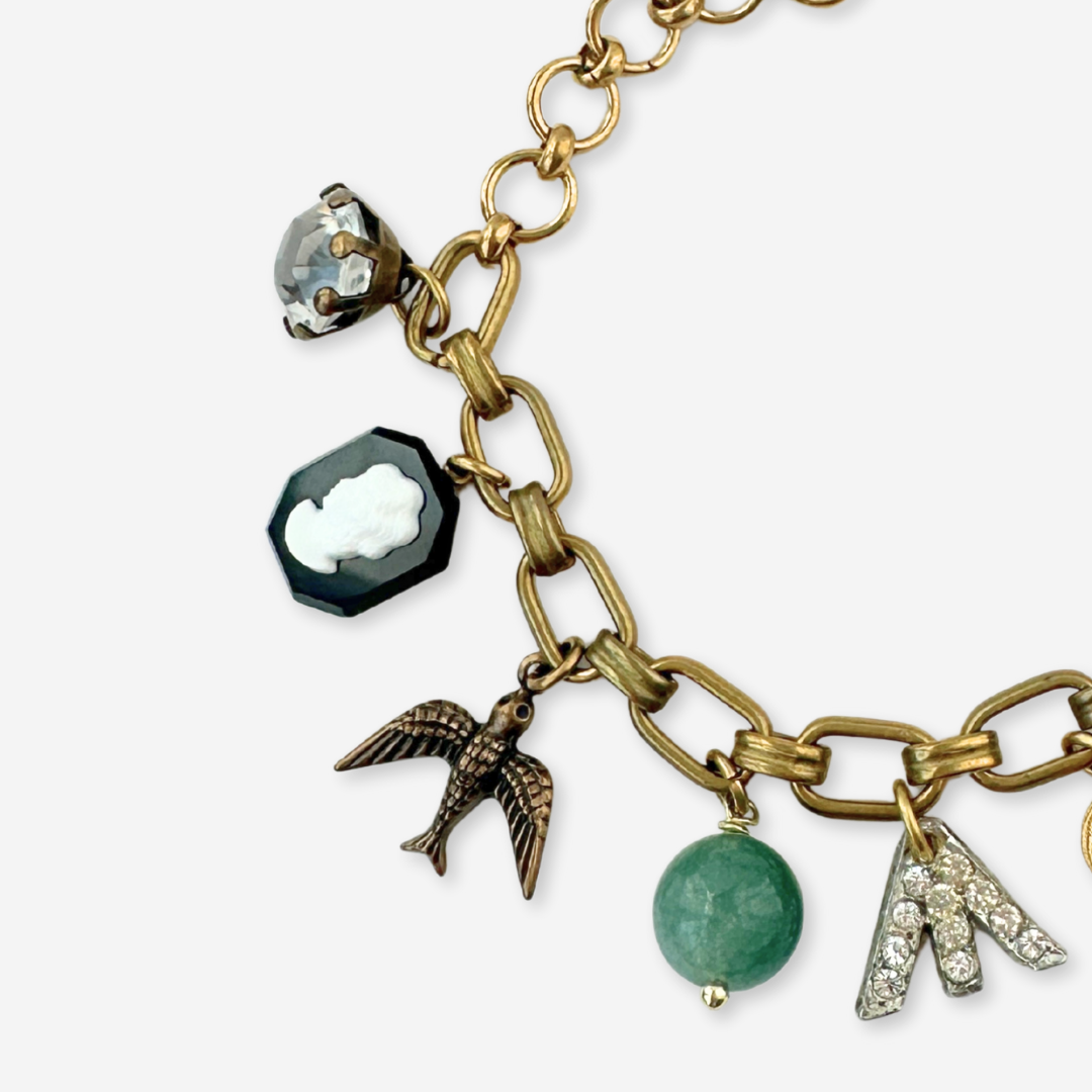 Repurposed vintage mixed charm bracelet