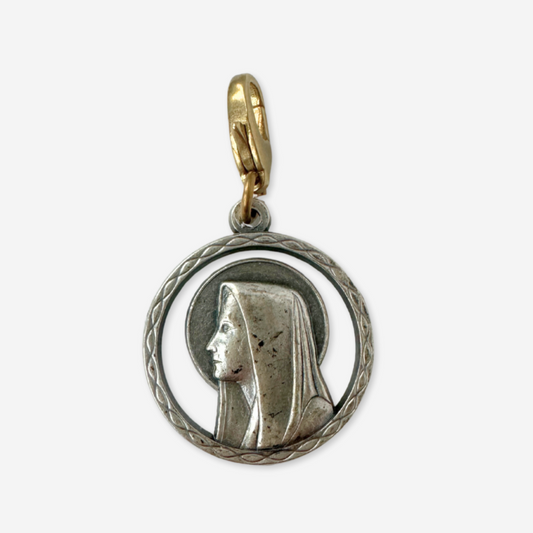 Vintage aged silver Blessed mother circular charm
