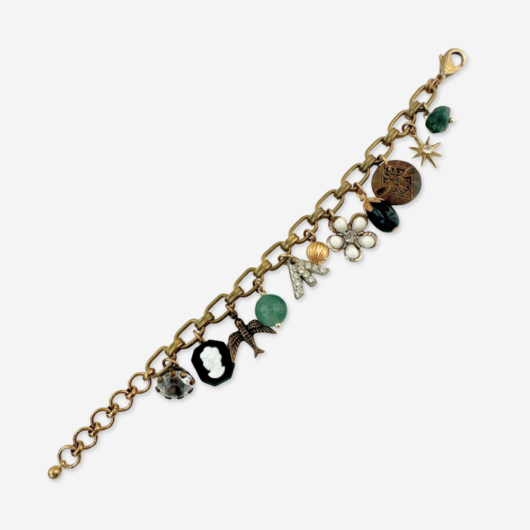 Repurposed vintage mixed charm bracelet