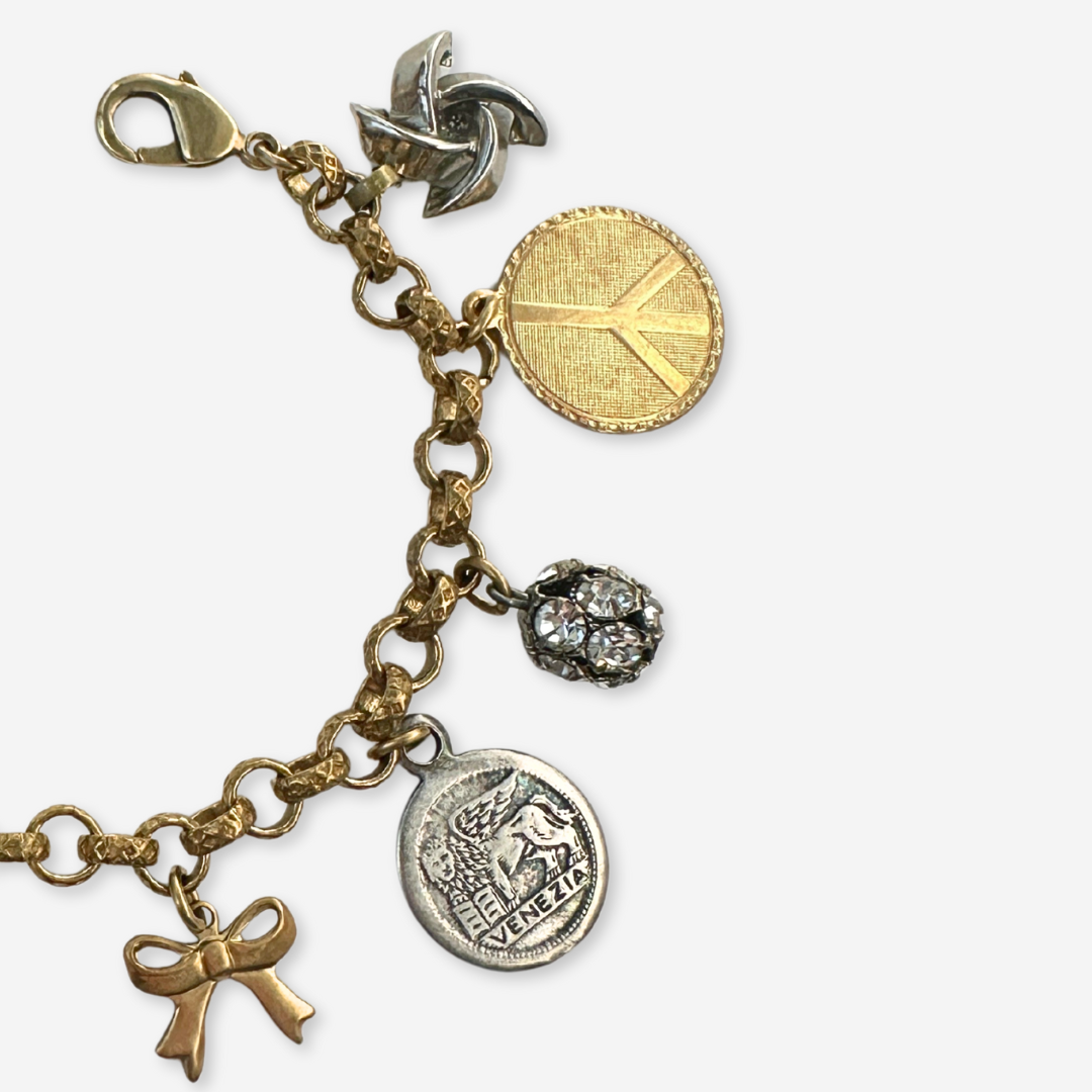 Repurposed vintage neutral mixed charm bracelet