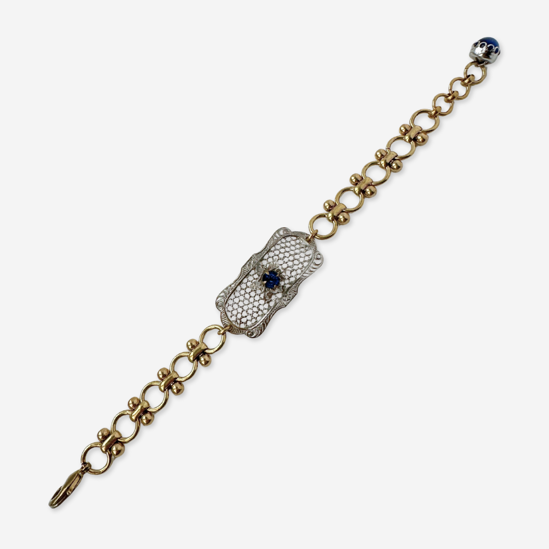 Repurposed antique oval silver mesh bracelet with blue rhinestone centerpiece
