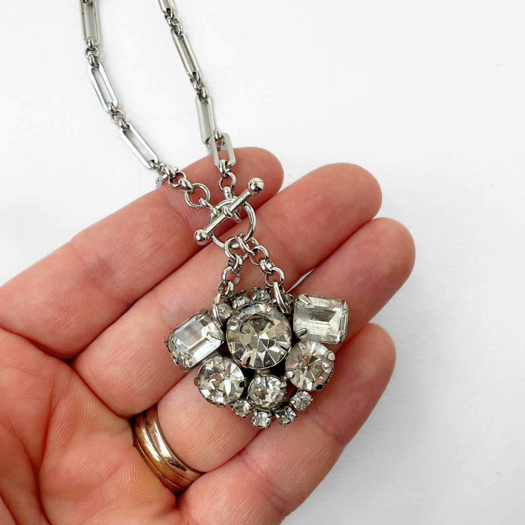 Vintage clear rhinestone pendant with silver plated oval link chain