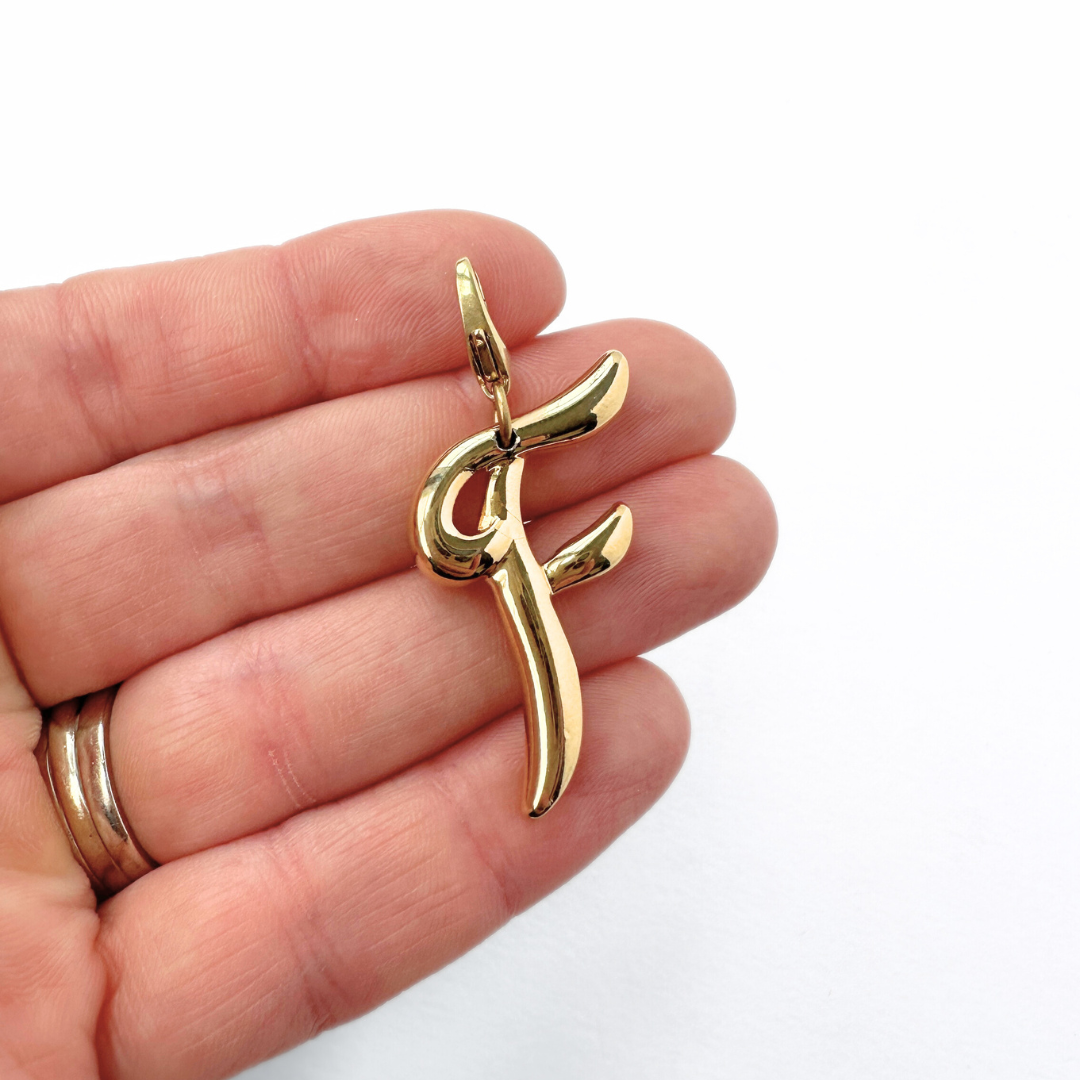 Large vintage shiny gold letter "F" charm