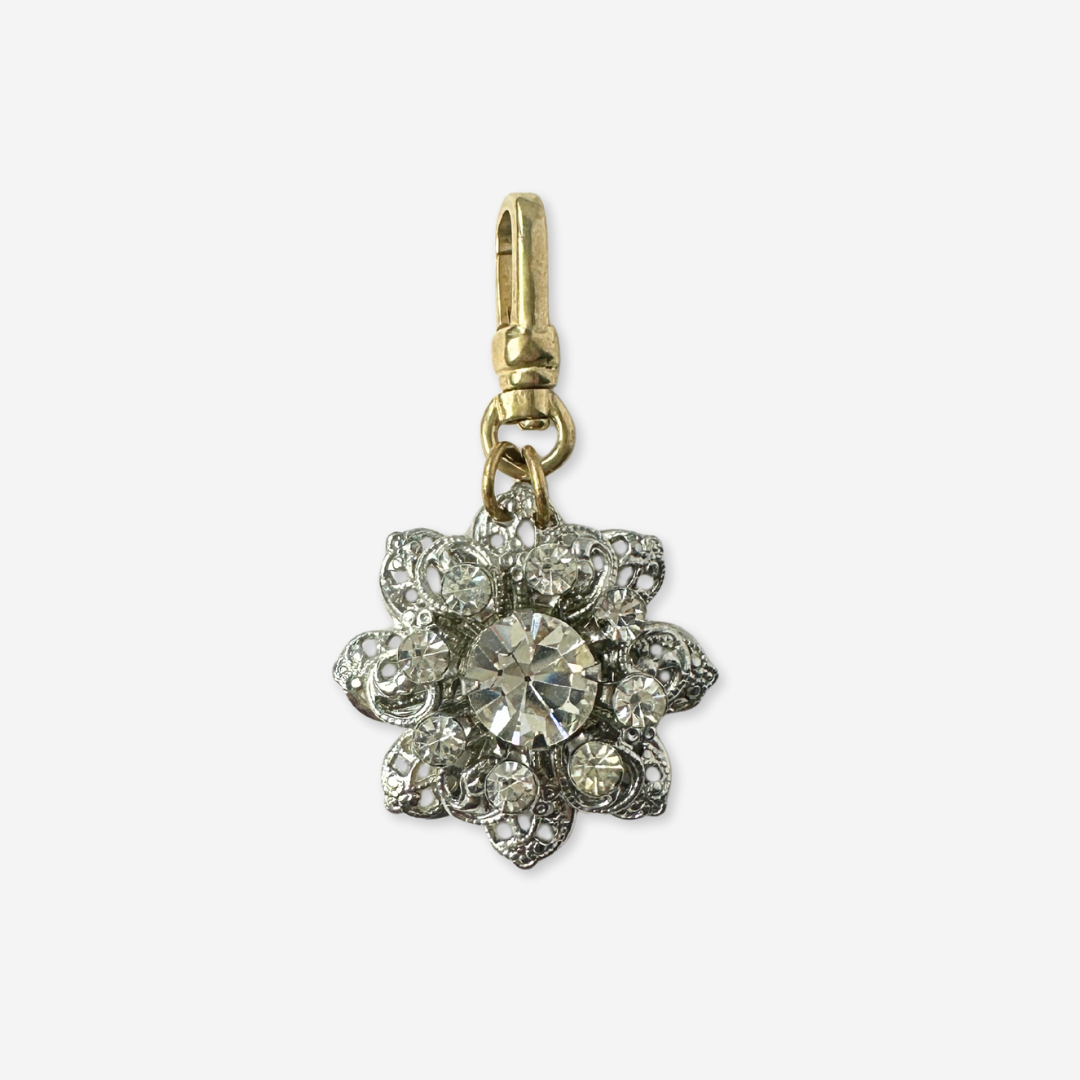 Vintage clear rhinestone and silver filigree flower charm