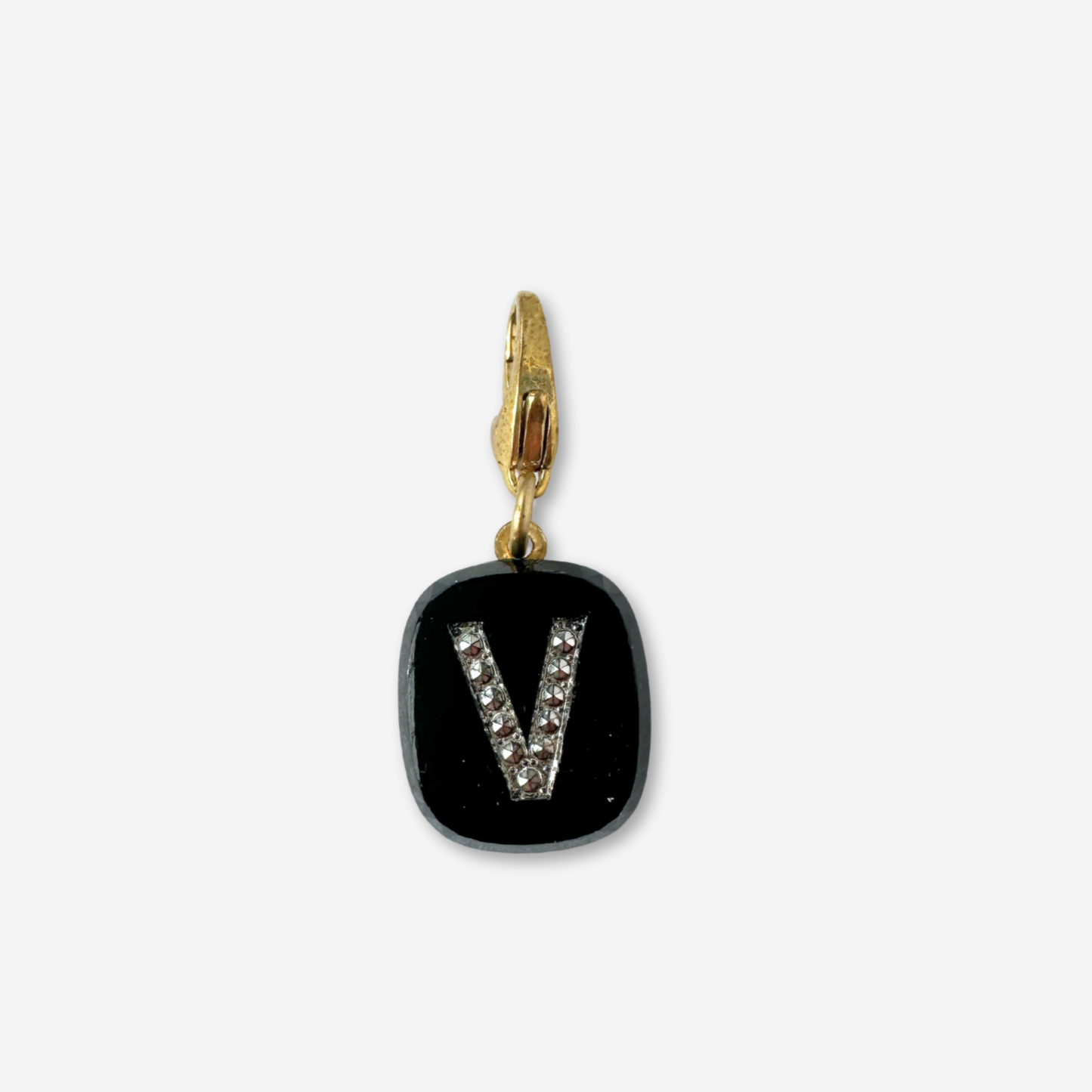 Vintage black glass letter "V" charm
