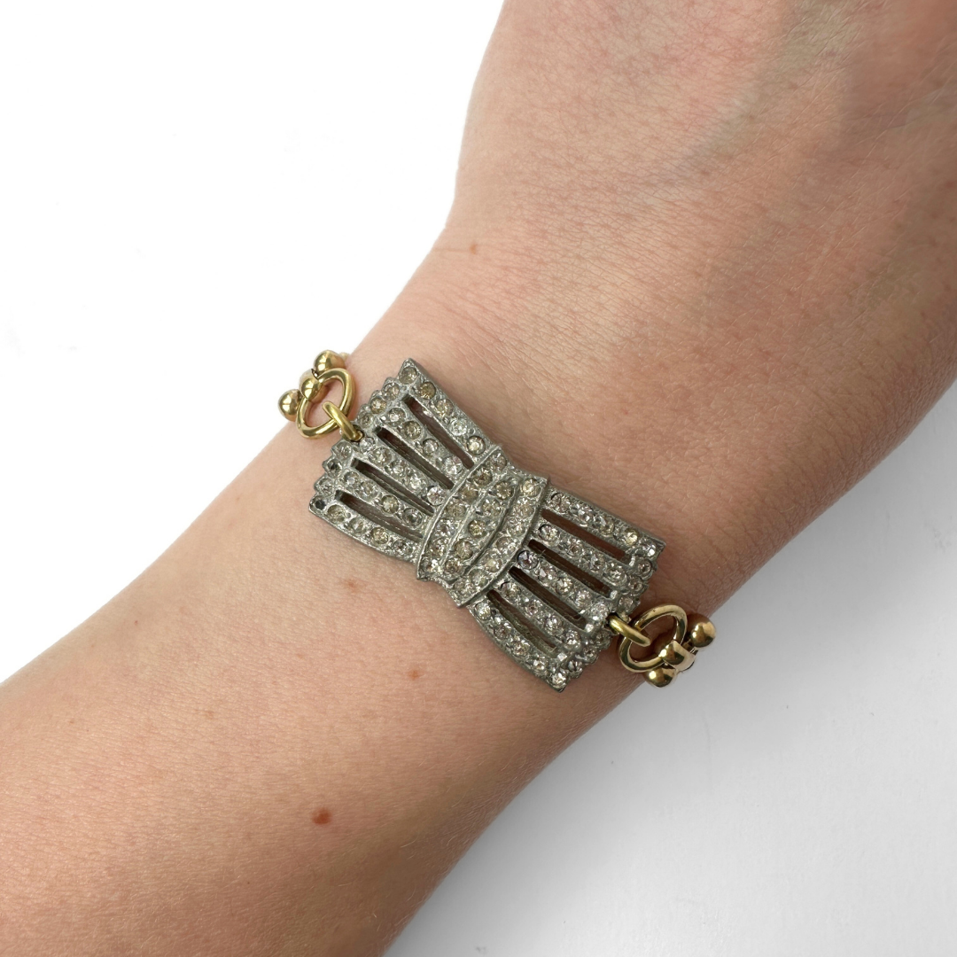 Refashioned vintage clear rhinestone bow bracelet with brass chain