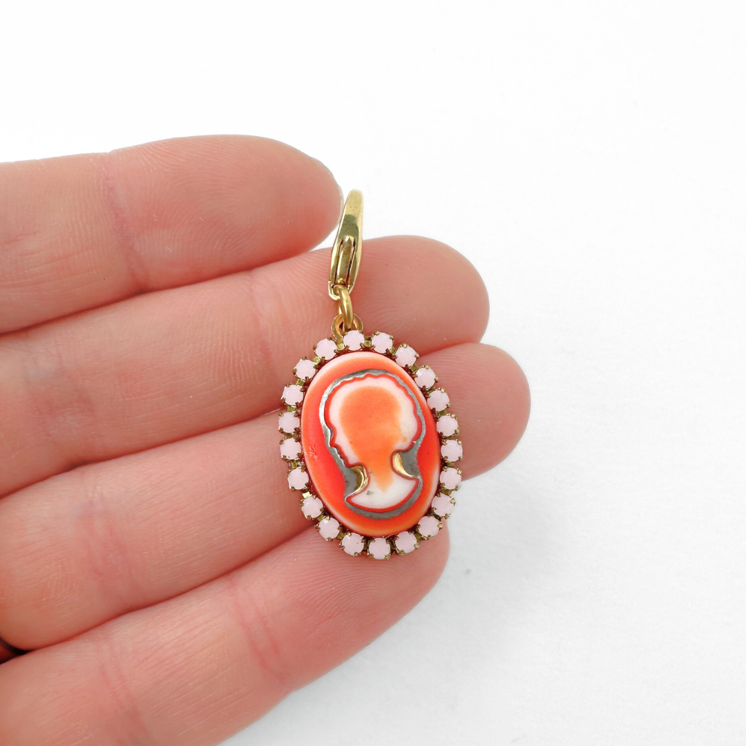 Refashioned vintage orange and pink glass oval cameo charm
