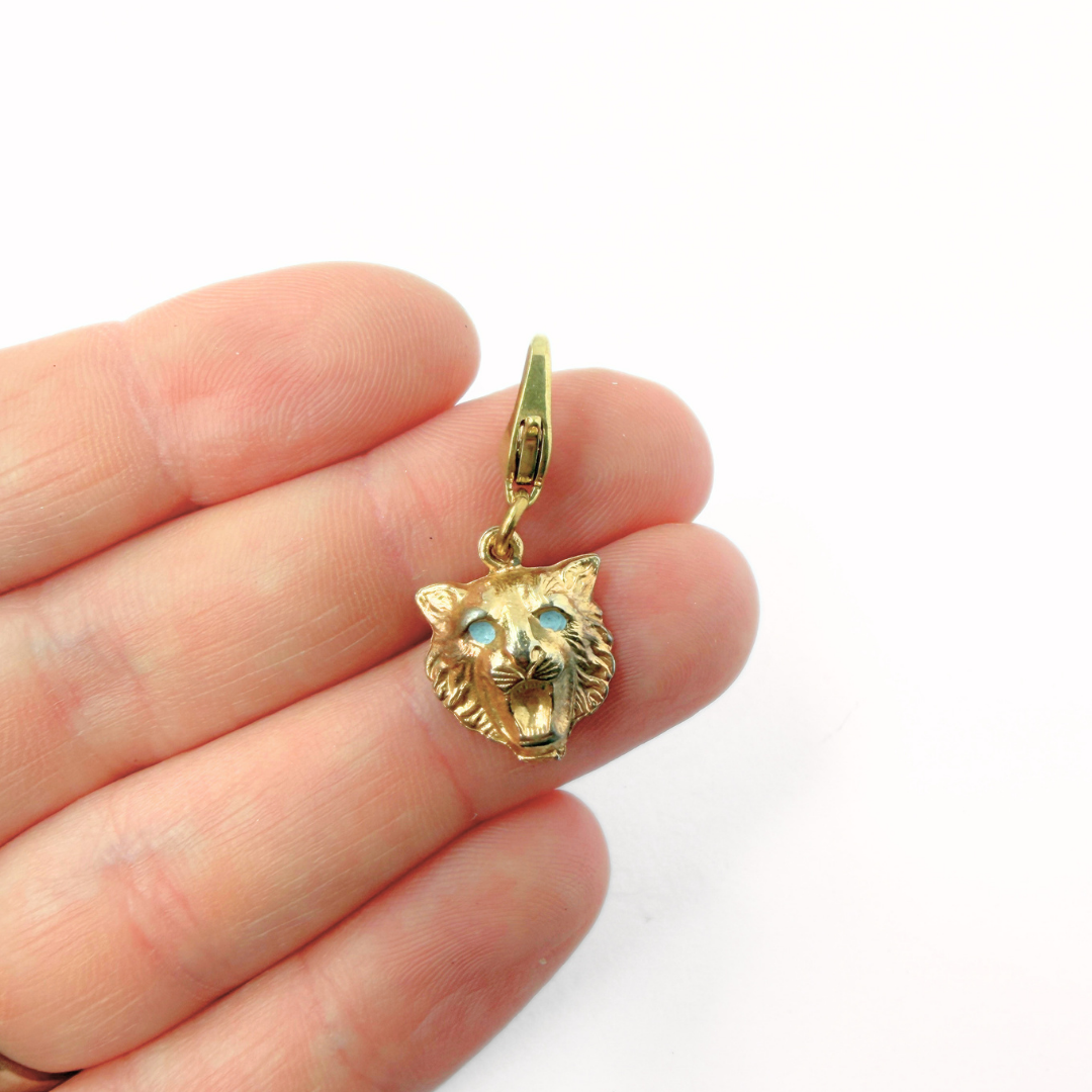 Small vintage gold tone tiger cat face charm