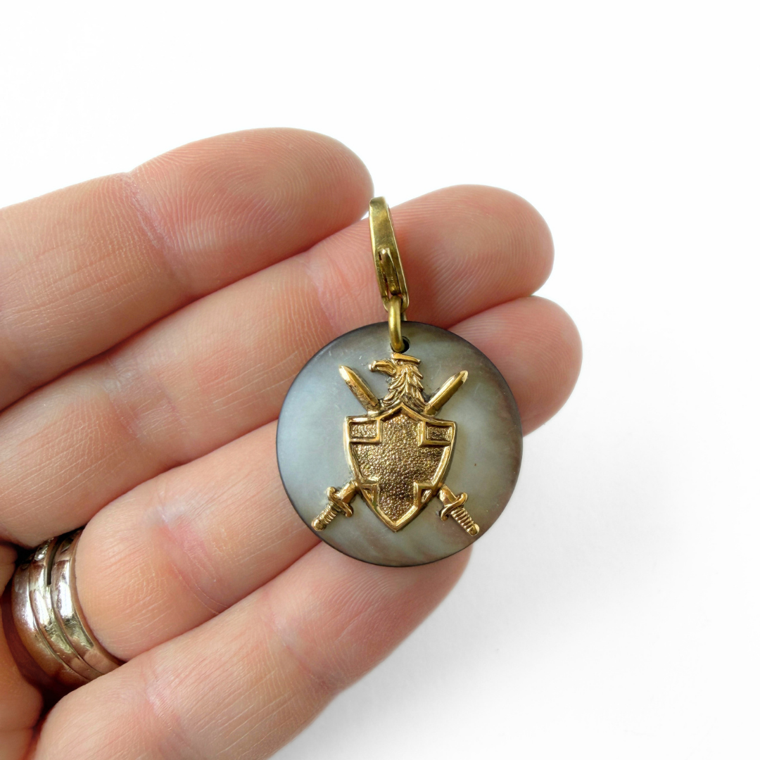 Vintage abalone shell button charm with coat of arms embellishment