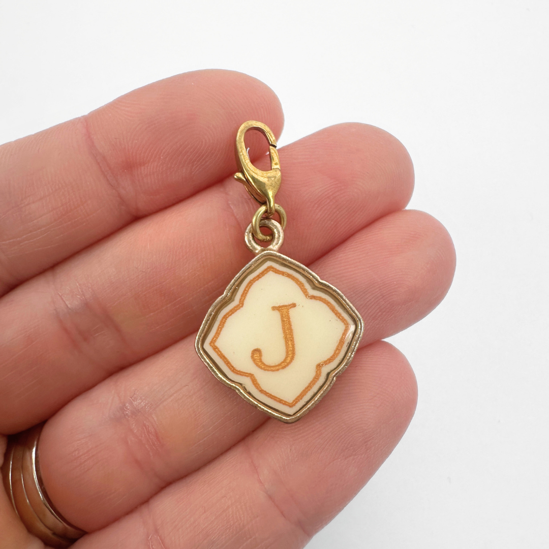 Vintage cream and gold "J" monogram charm