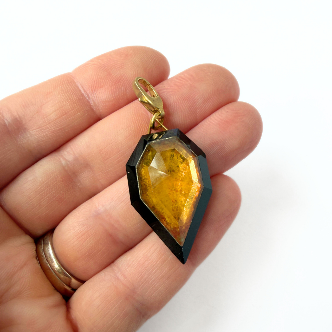 Refashioned antique black and topaz faceted Czech glass charm