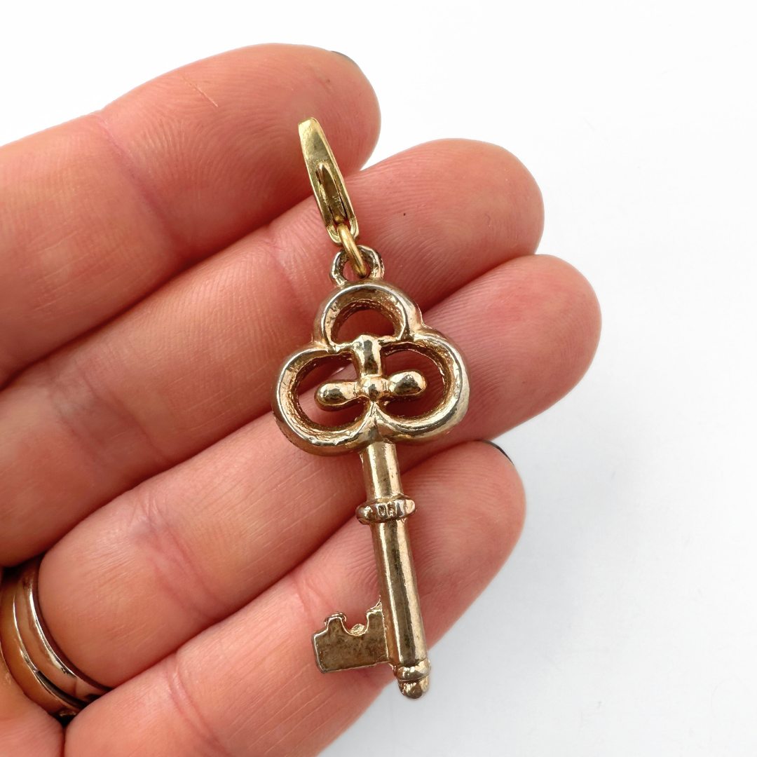 Vintage muted gold skeleton key charm pendant