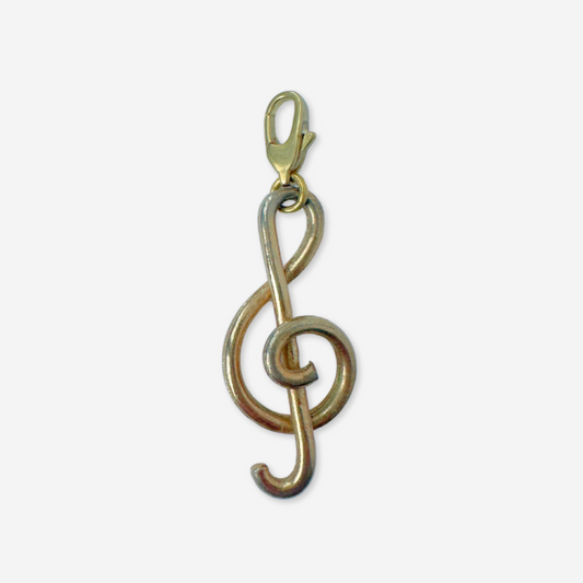 Vintage muted gold treble clef charm pendant