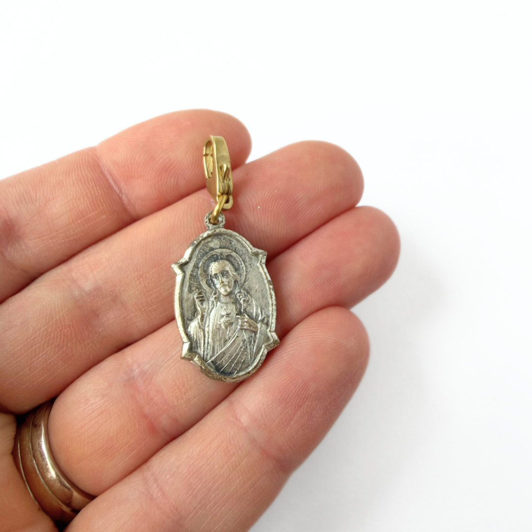 Vintage aged silver Jesus/ Lady of Mt. Carmel oval charm