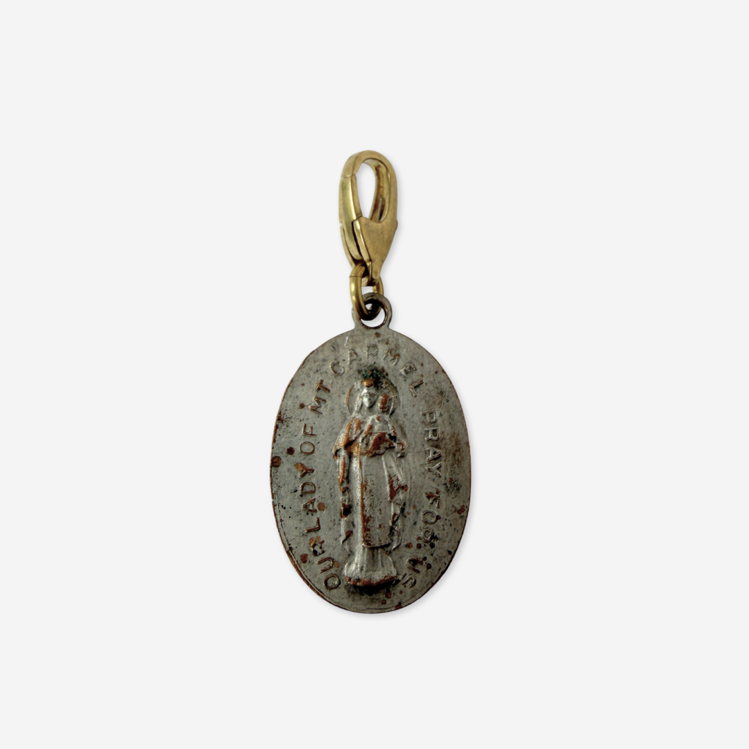 Vintage aged silver Lady of Mt. Carmel oval charm