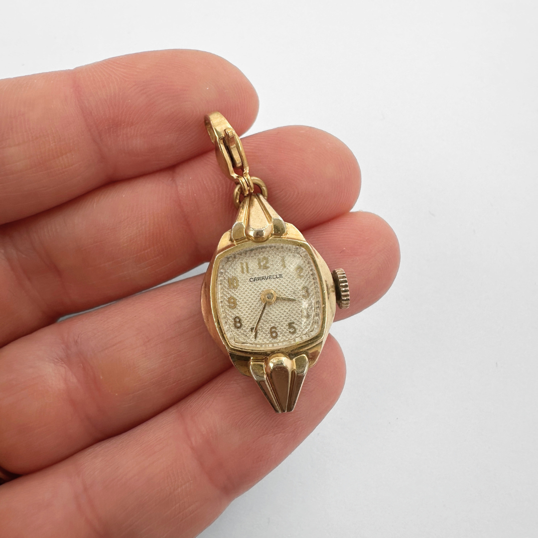 Vintage gold tone watch face charm