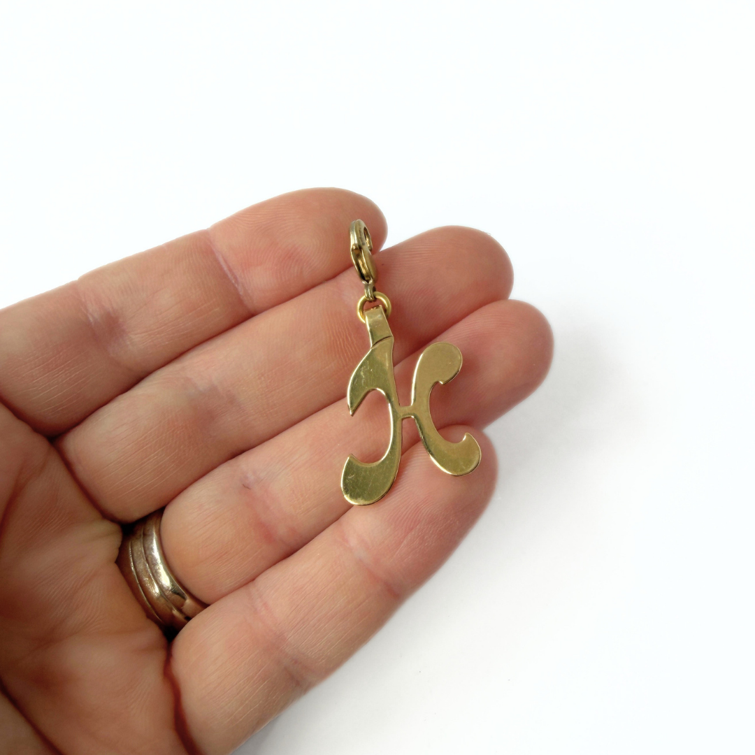 Vintage shiny gold letter "H" charm