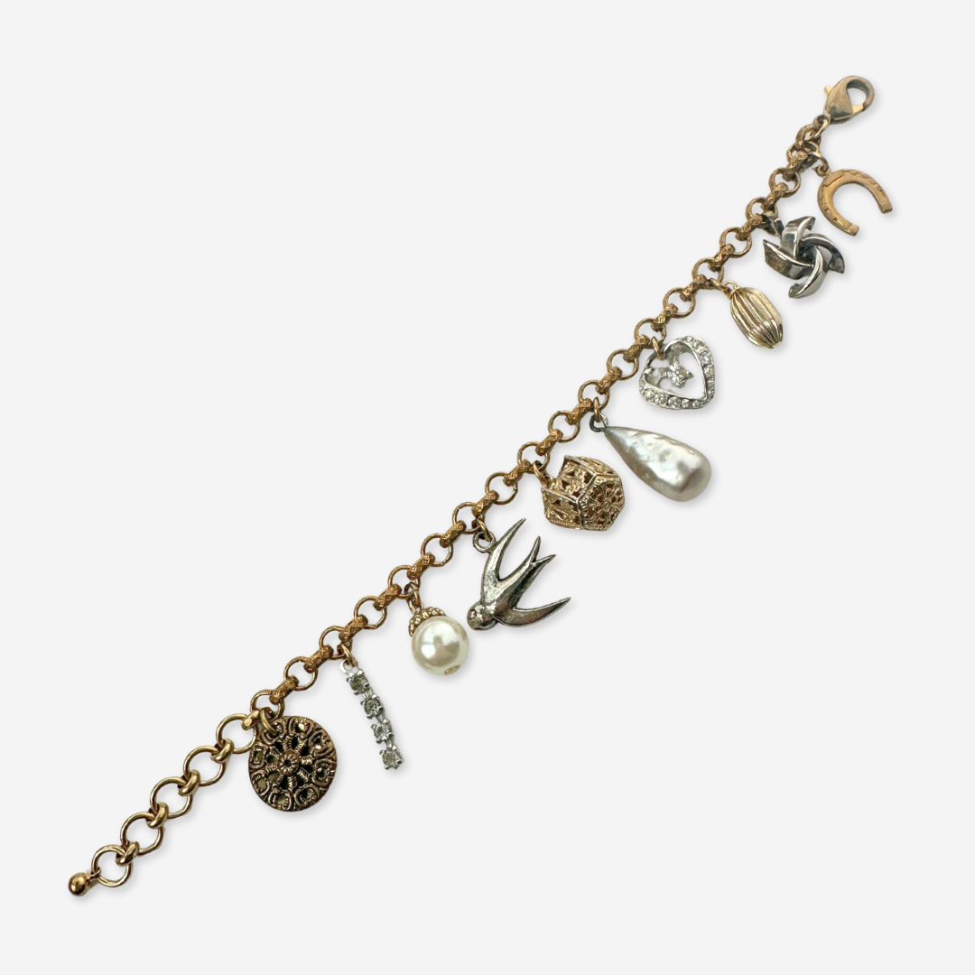 Repurposed vintage neutral mixed charm bracelet