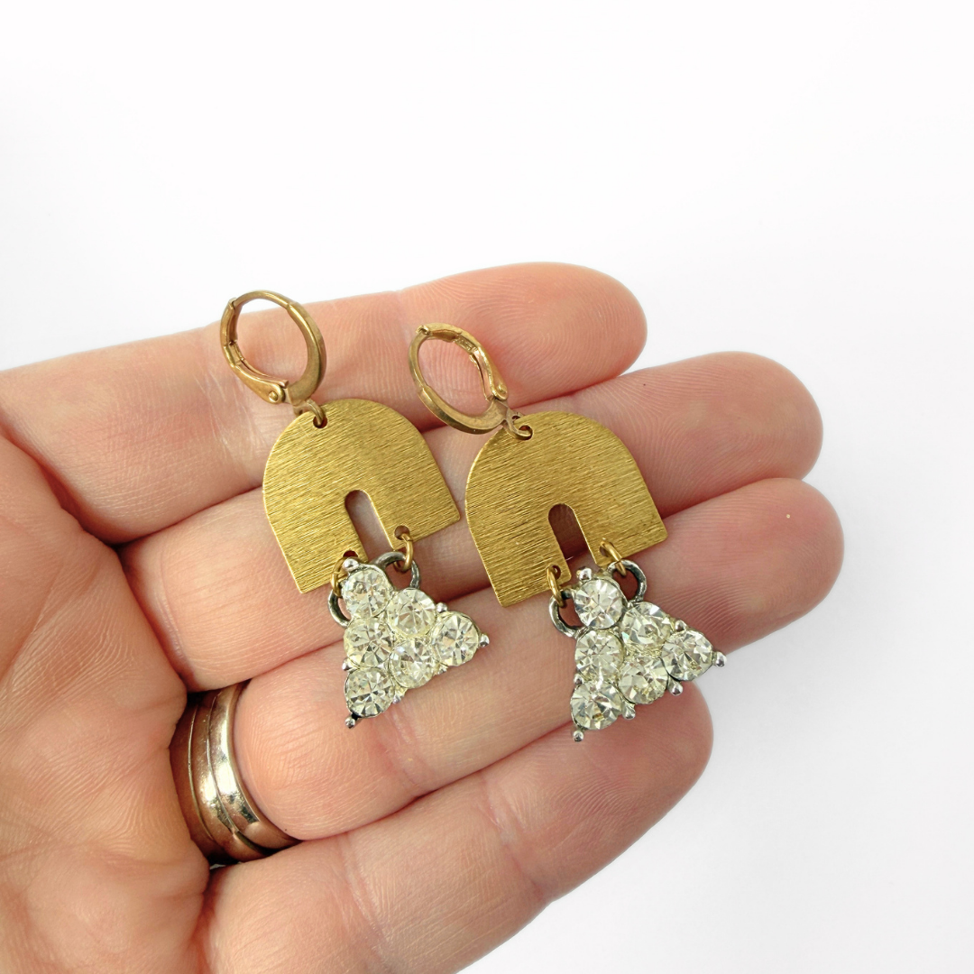 Vintage triangular clear rhinestone drop earrings with brass rainbow link