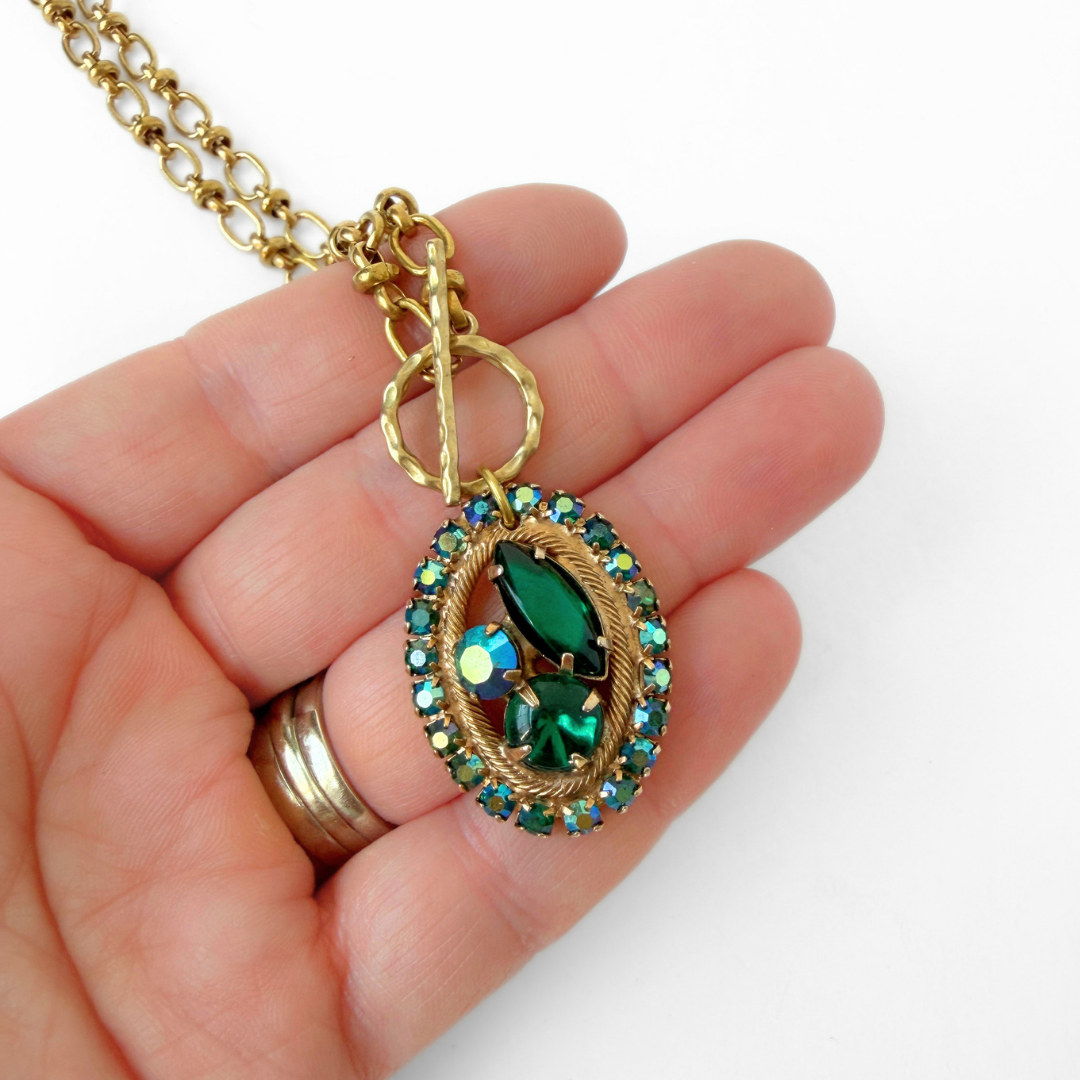 Refashioned vintage iridescent emerald green rhinestone oval pendant on brass chain
