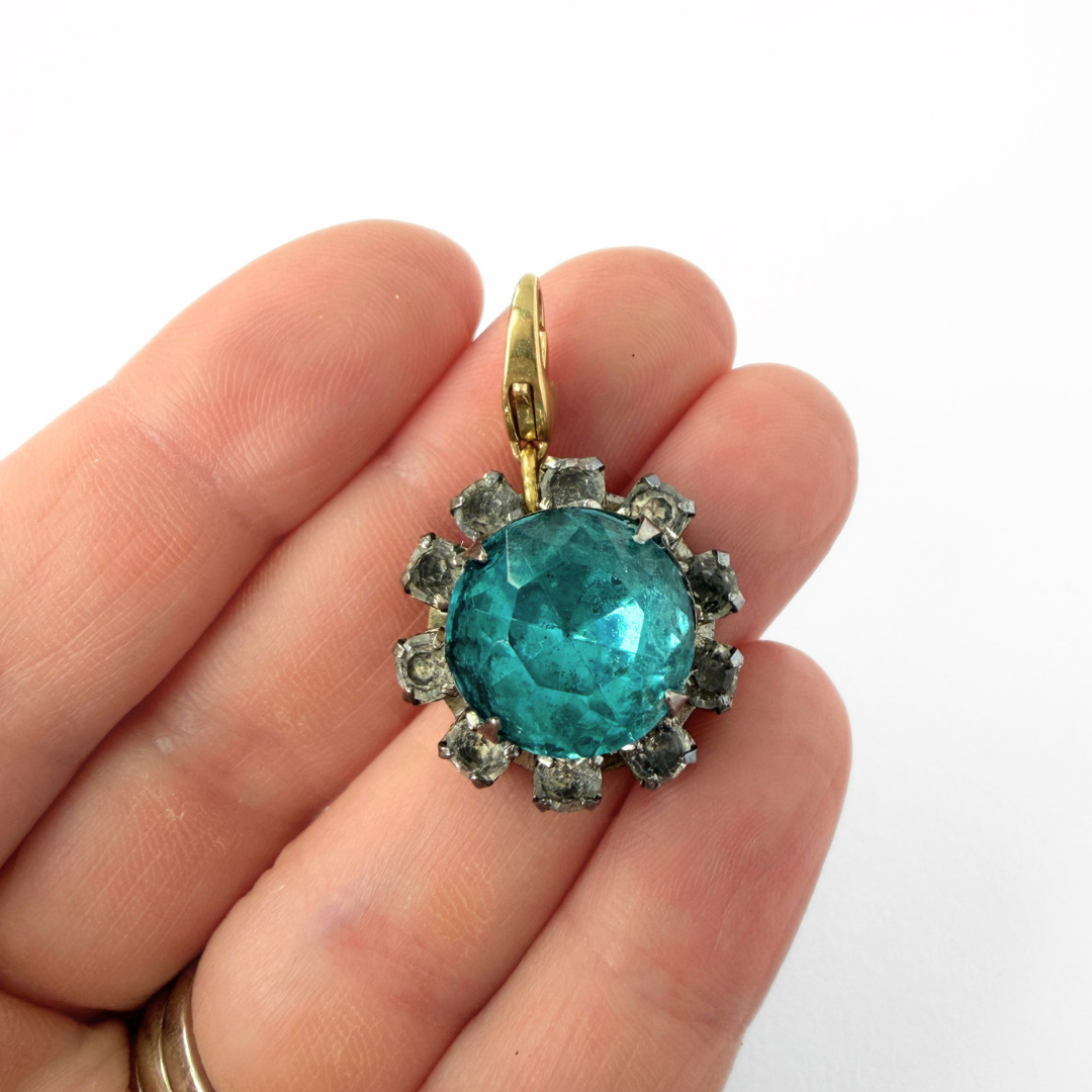Vintage aqua blue and clear rhinestone circular charm