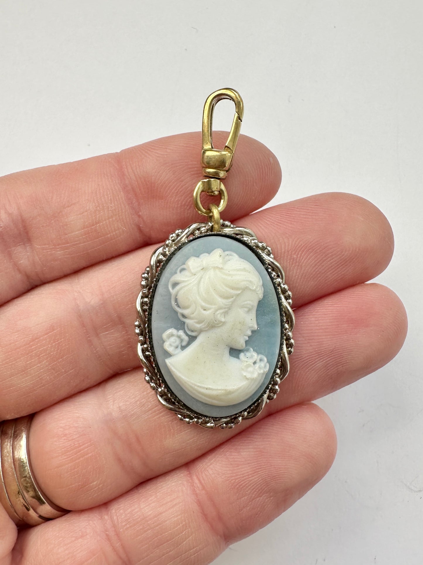 Vintage powder blue cameo charm with silver setting and brass swivel clasp