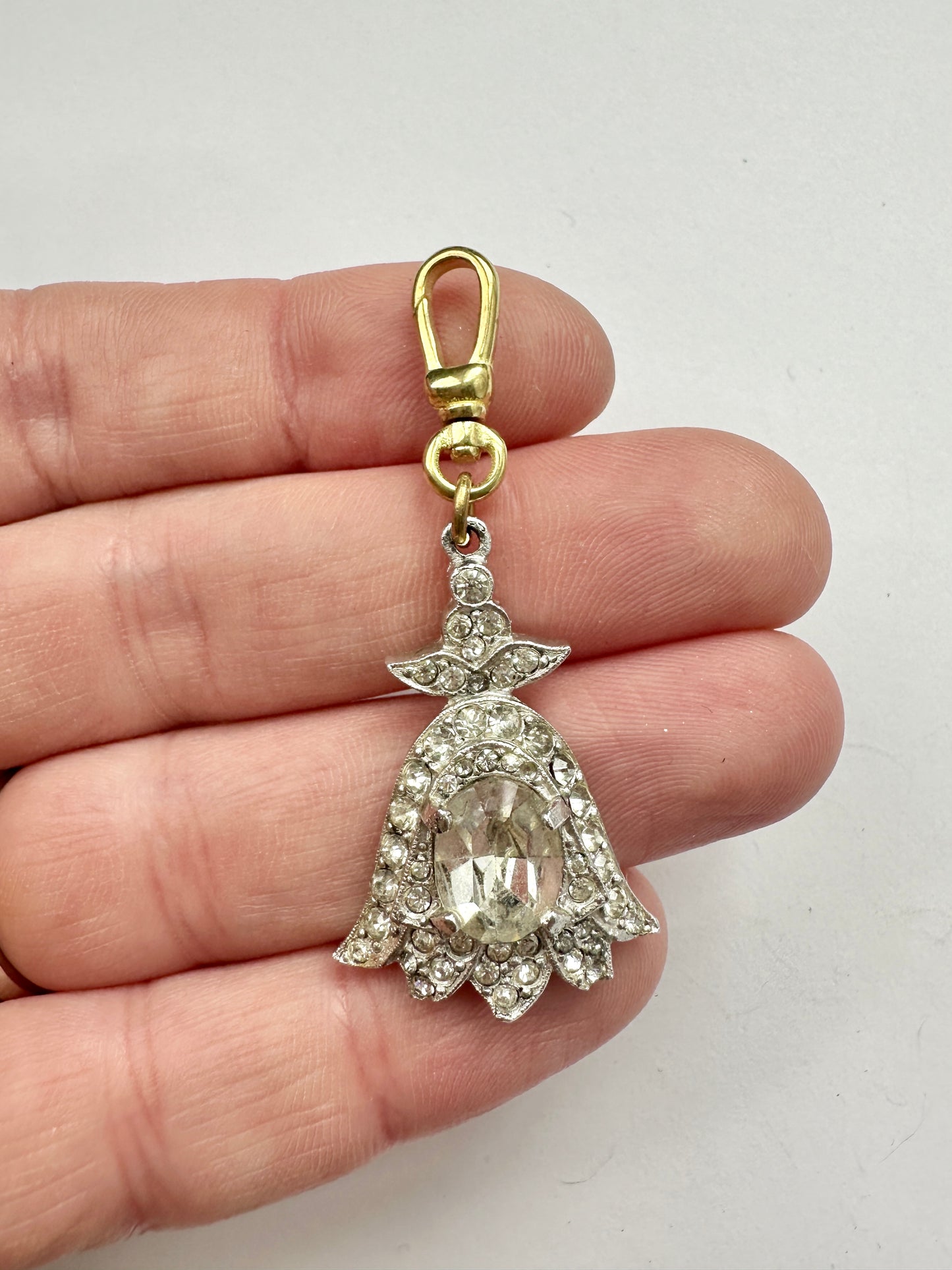 Vintage clear rhinestone floral charm on brass swivel clasp