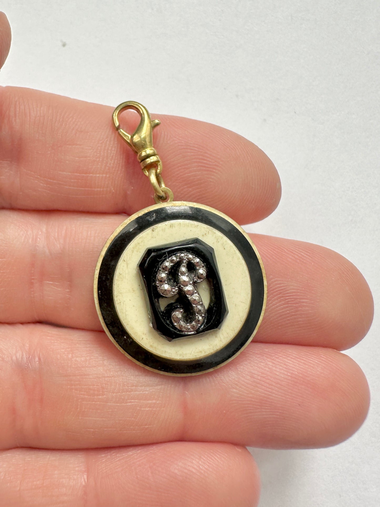 Vintage glass letter "P" charm on black and ivory button