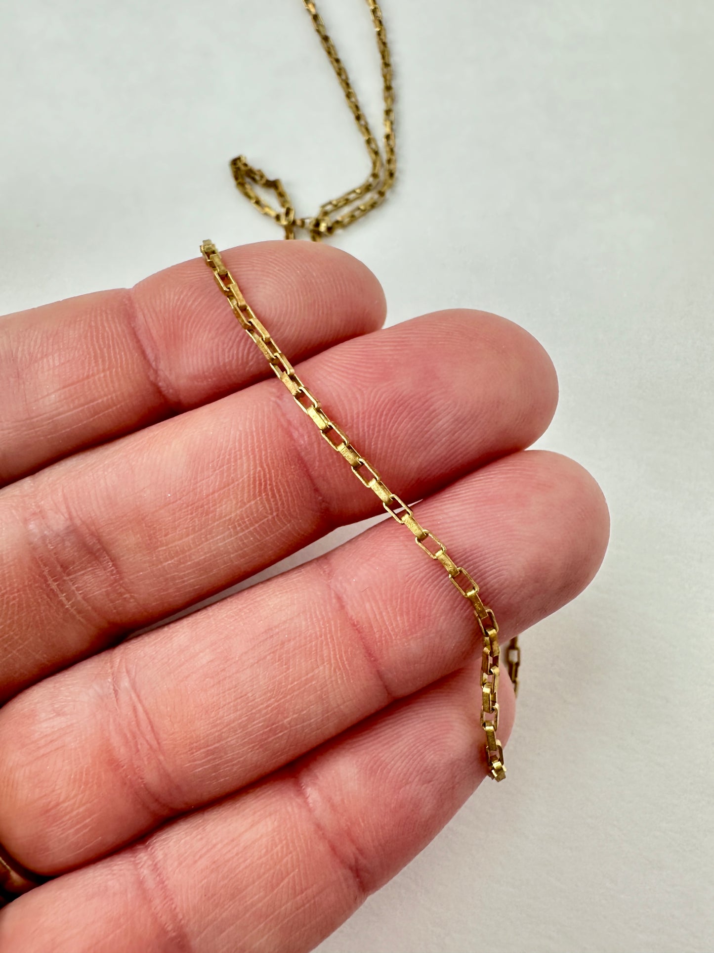 Plain raw brass rectangular box chain with lobster claw clasp
