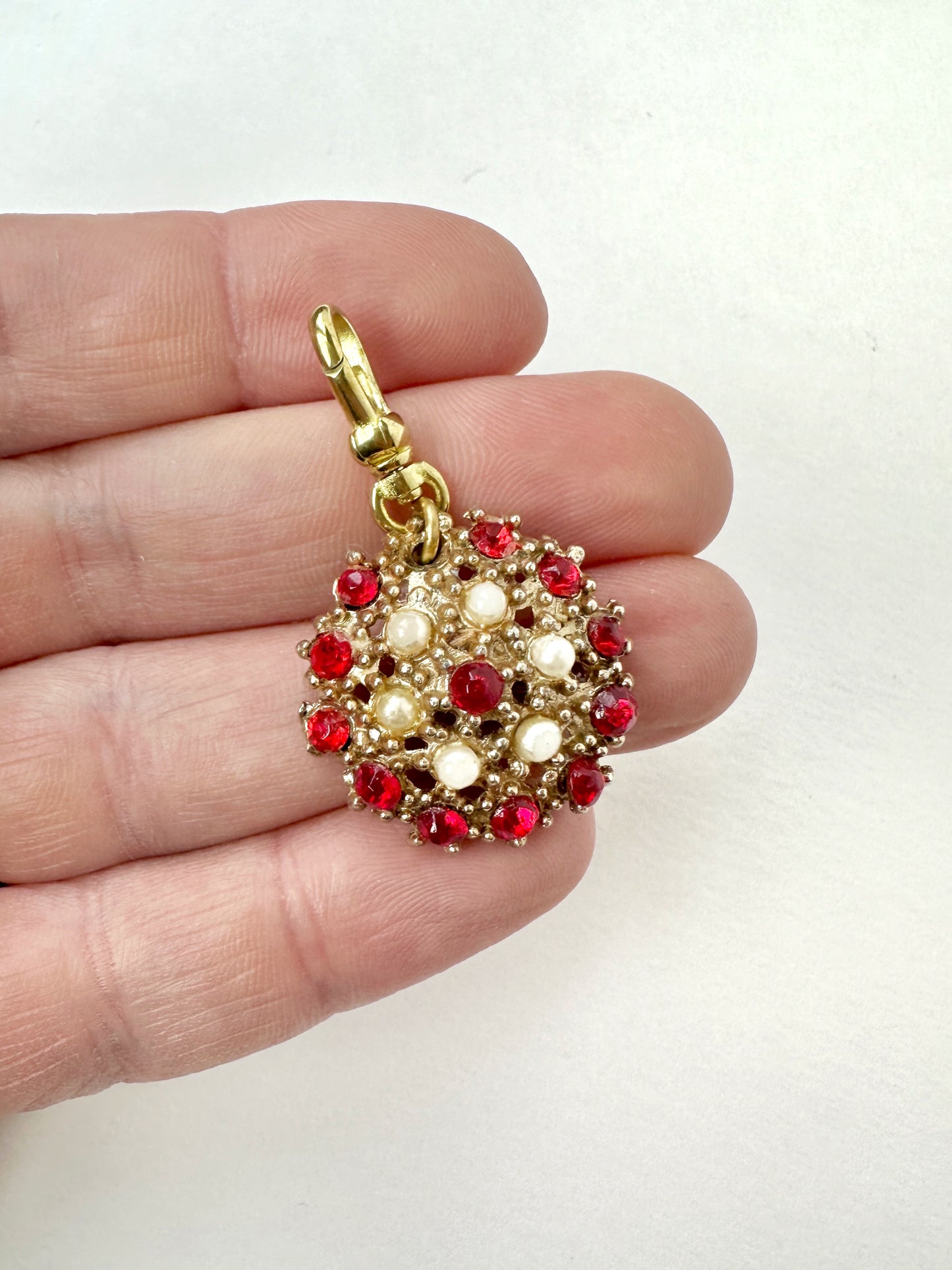 Red rhinestone and pearl vintage charm on brass swivel clasp