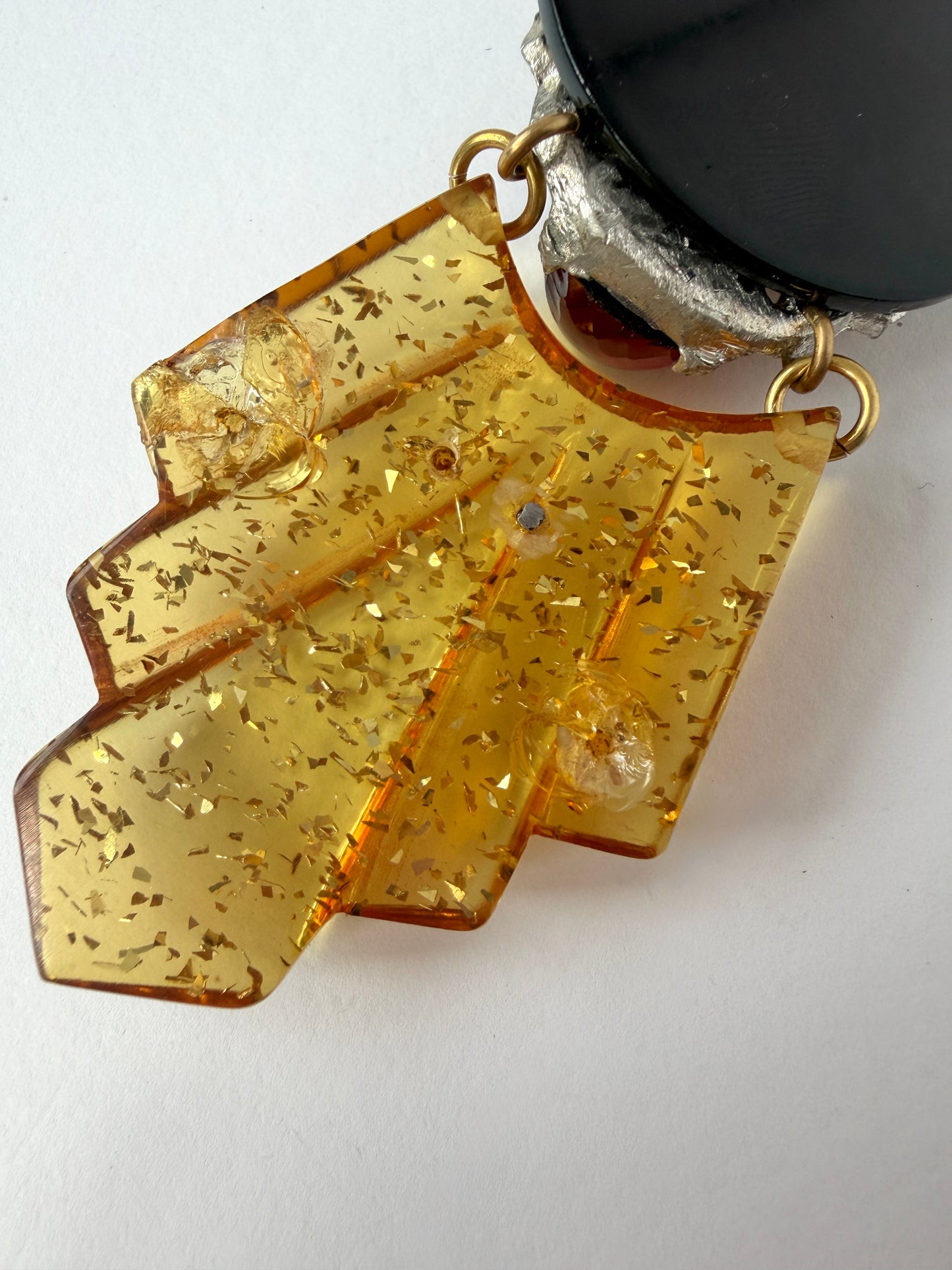 Repurposed Vintage red, black, and yellow bakelite, rhinestone assemblage pendant
