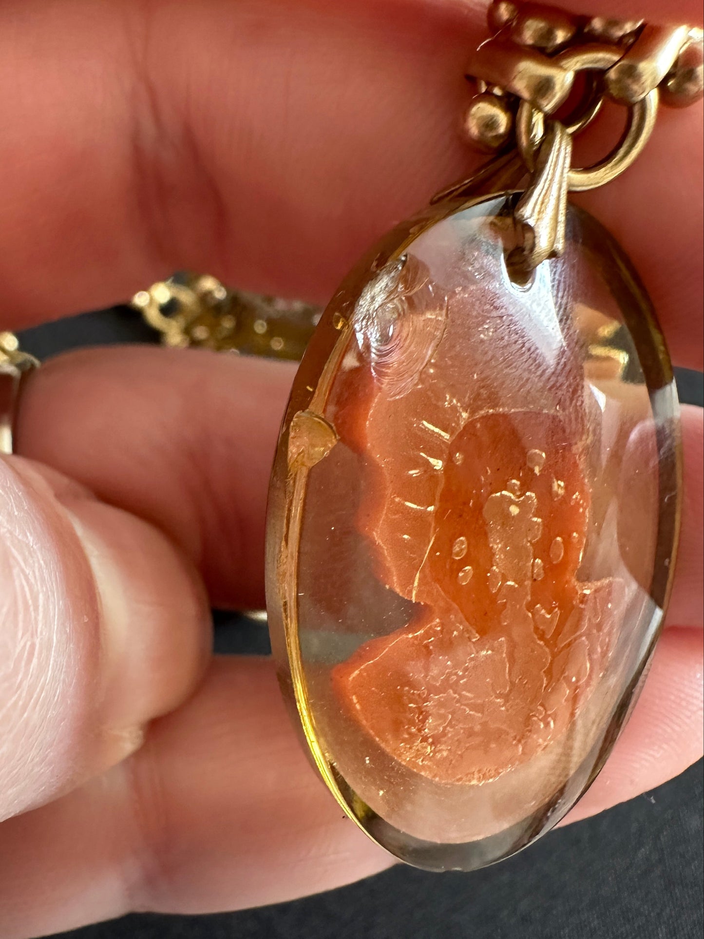 Repurposed vintage rust/coral cameo mixed charm necklace