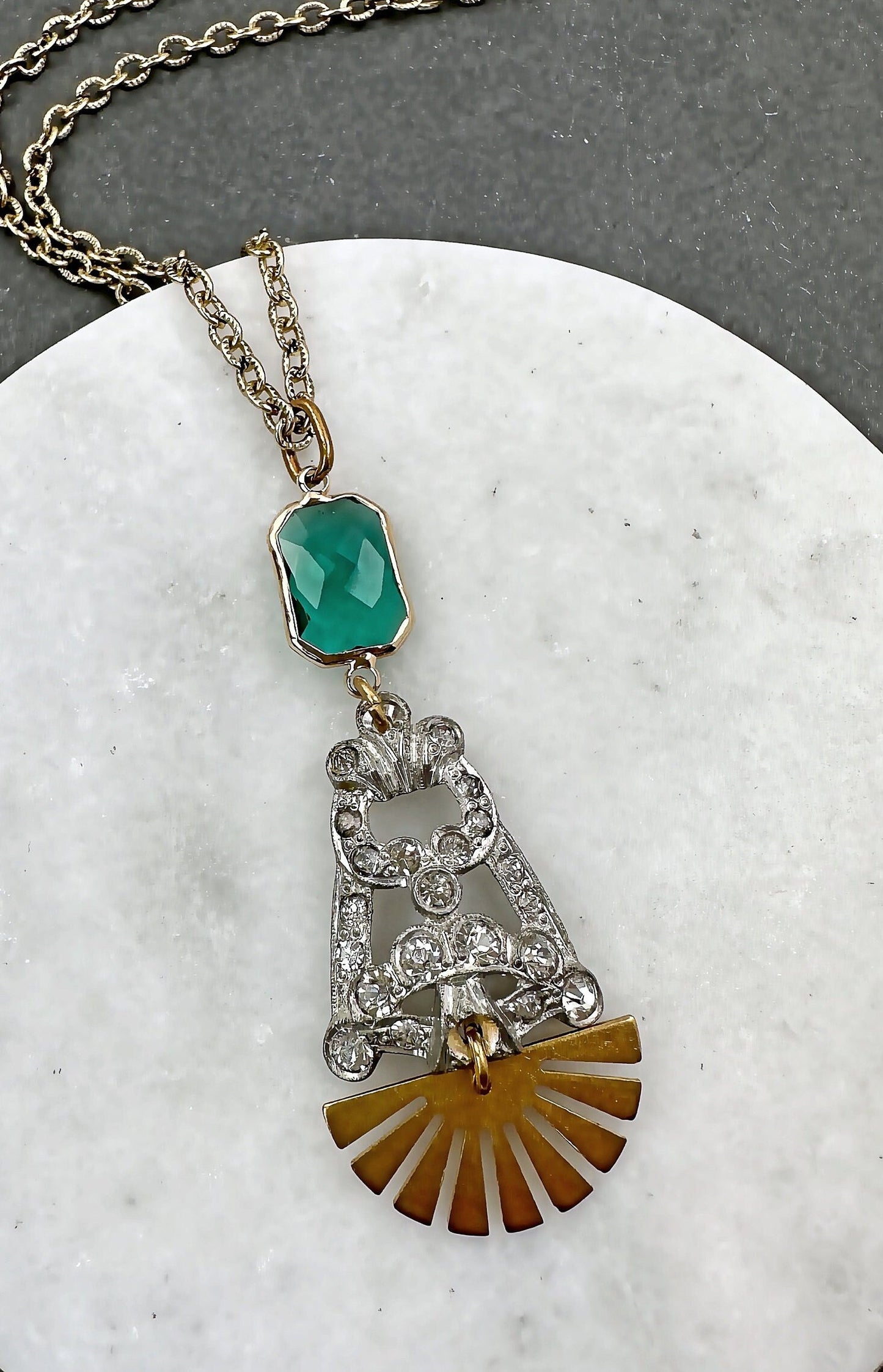 Refashioned Vintage Art Deco rhinestone long pendant necklace with brass sunburst and green crystal