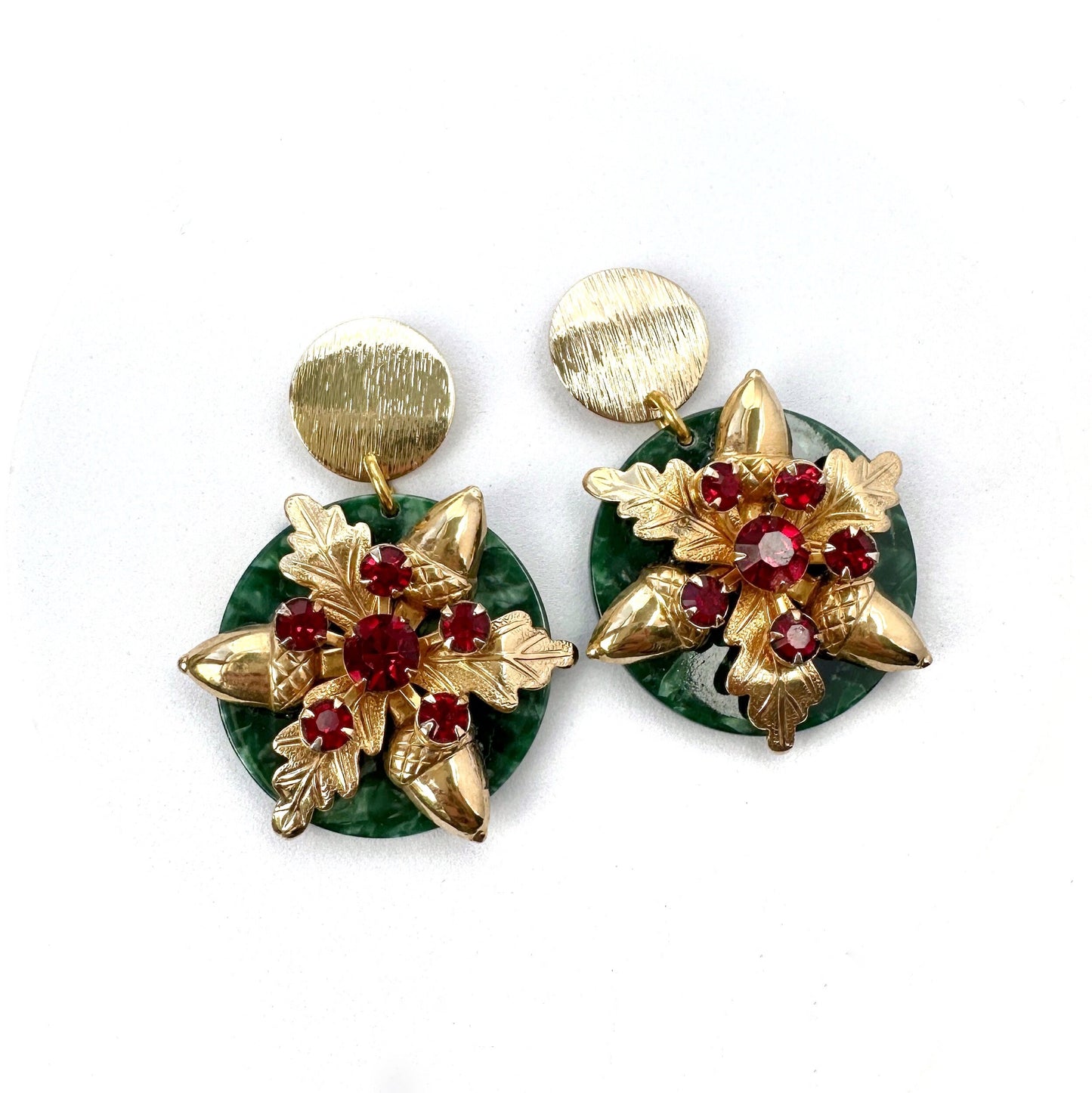 Large refashioned vintage red rhinestone holiday earrings with green acetate base