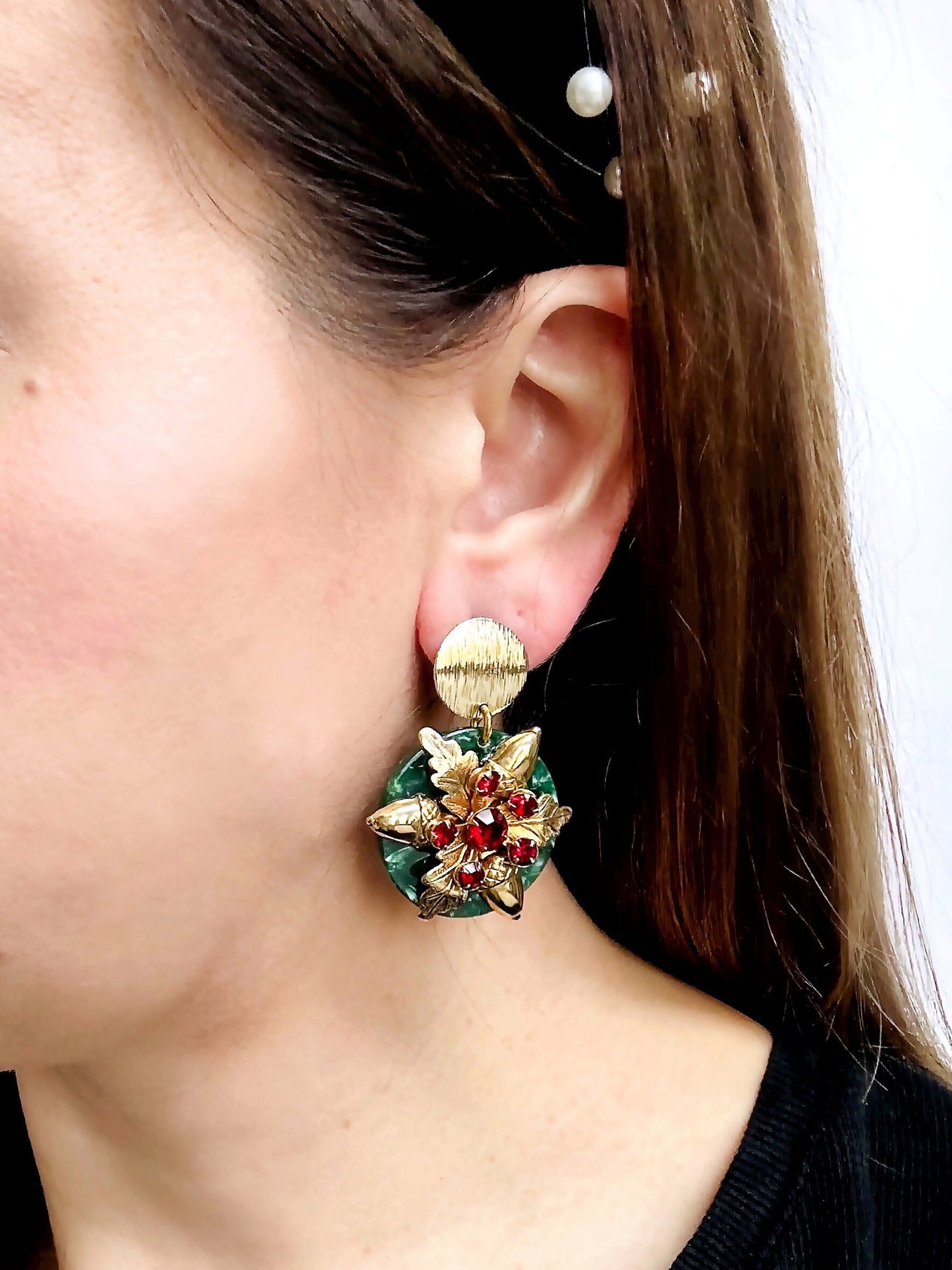 Large refashioned vintage red rhinestone holiday earrings with green acetate base