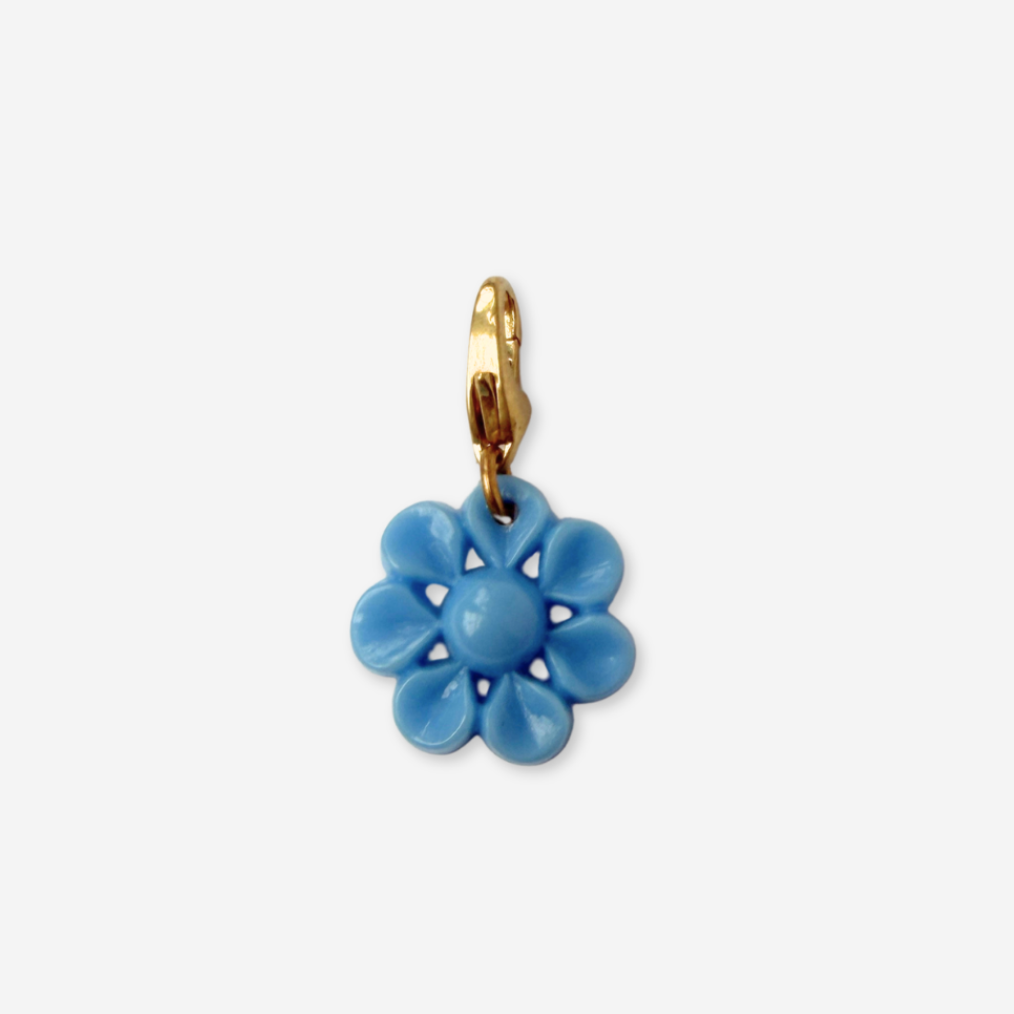 Small vintage powder blue plastic flower button charm