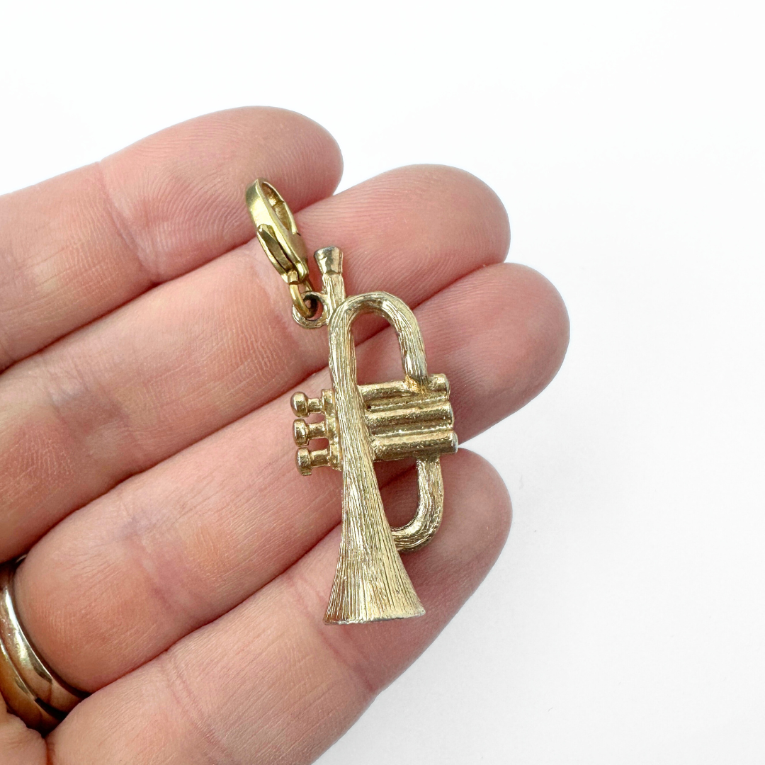 Vintage muted gold trumpet charm pendant