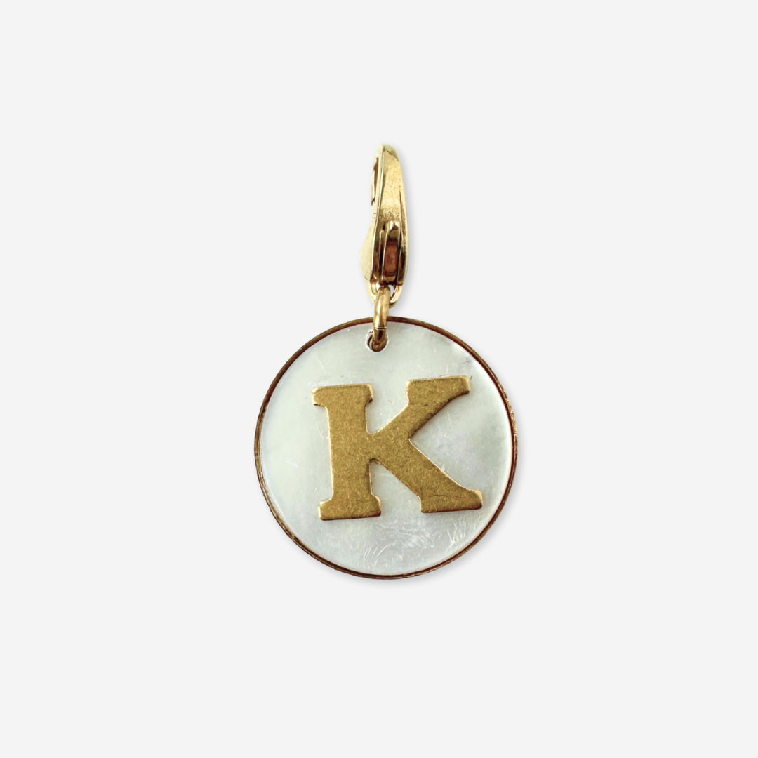 Vintage mother of pearl and brass "K" circle monogram charm