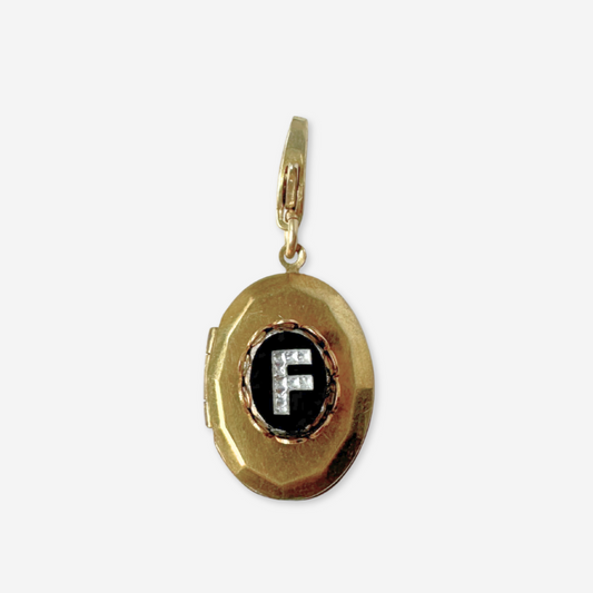 Vintage brass locket with black glass "F" monogram
