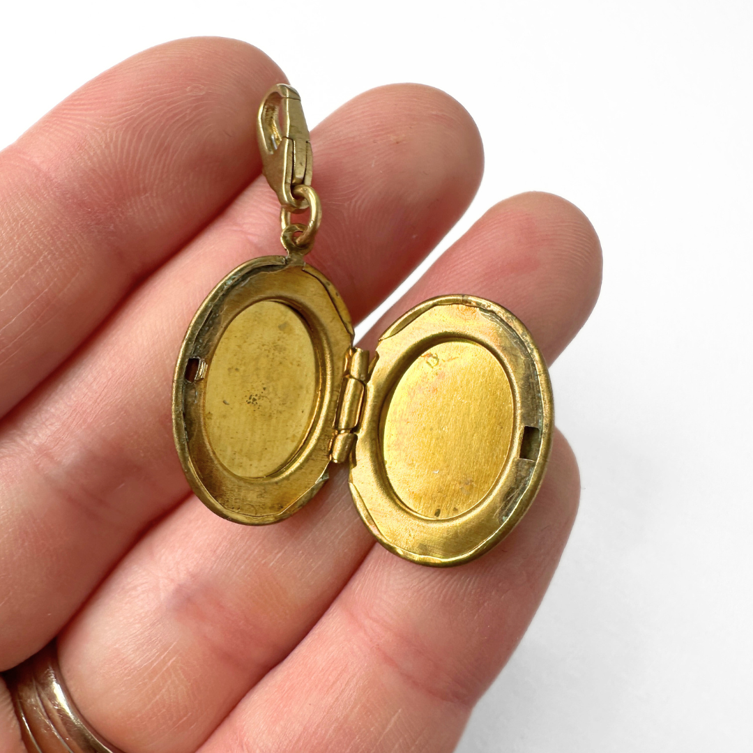 Vintage brass locket with black glass "F" monogram