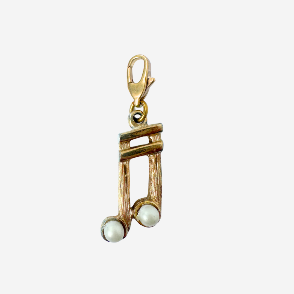 Vintage muted gold music note charm with pearl accent