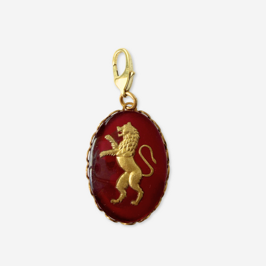 Vintage maroon and gold lion intaglio charm