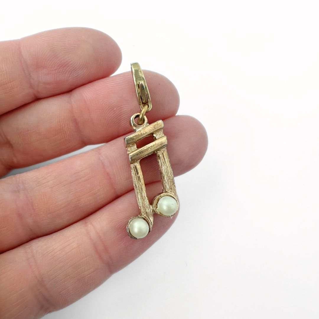 Vintage muted gold music note charm with pearl accent